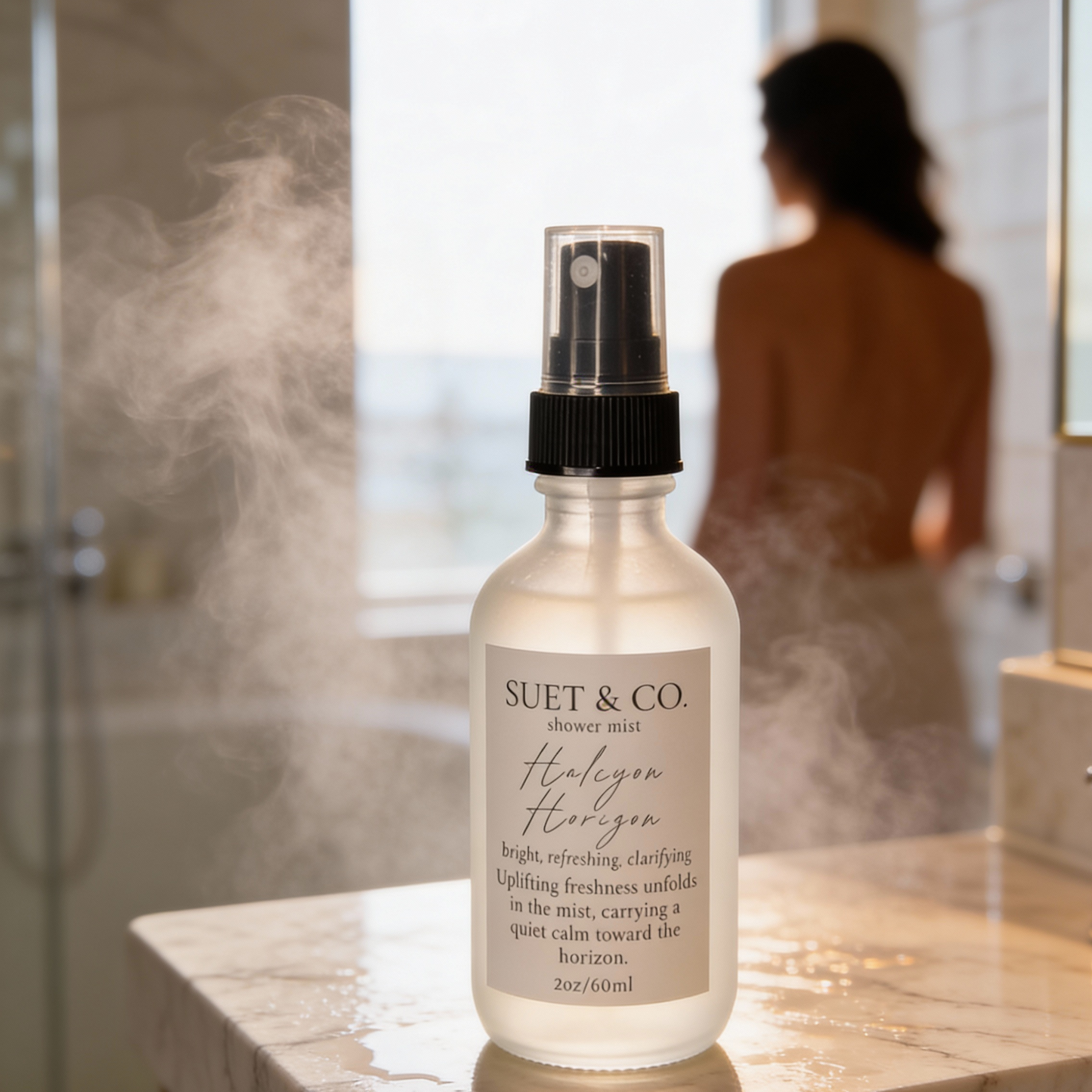 Suet & Co.  Halcyon Horizon shower mist bottle on a bathroom counter with steam in the background